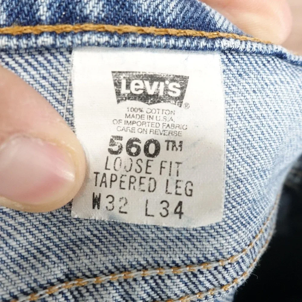 Vintage Levis 560 Jeans 32x34 (31x33) Blue Loose Tapered USA Orange Tab